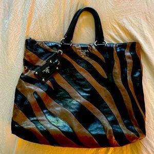 Hate to sell this Prada bag .. get so many compliments on it.